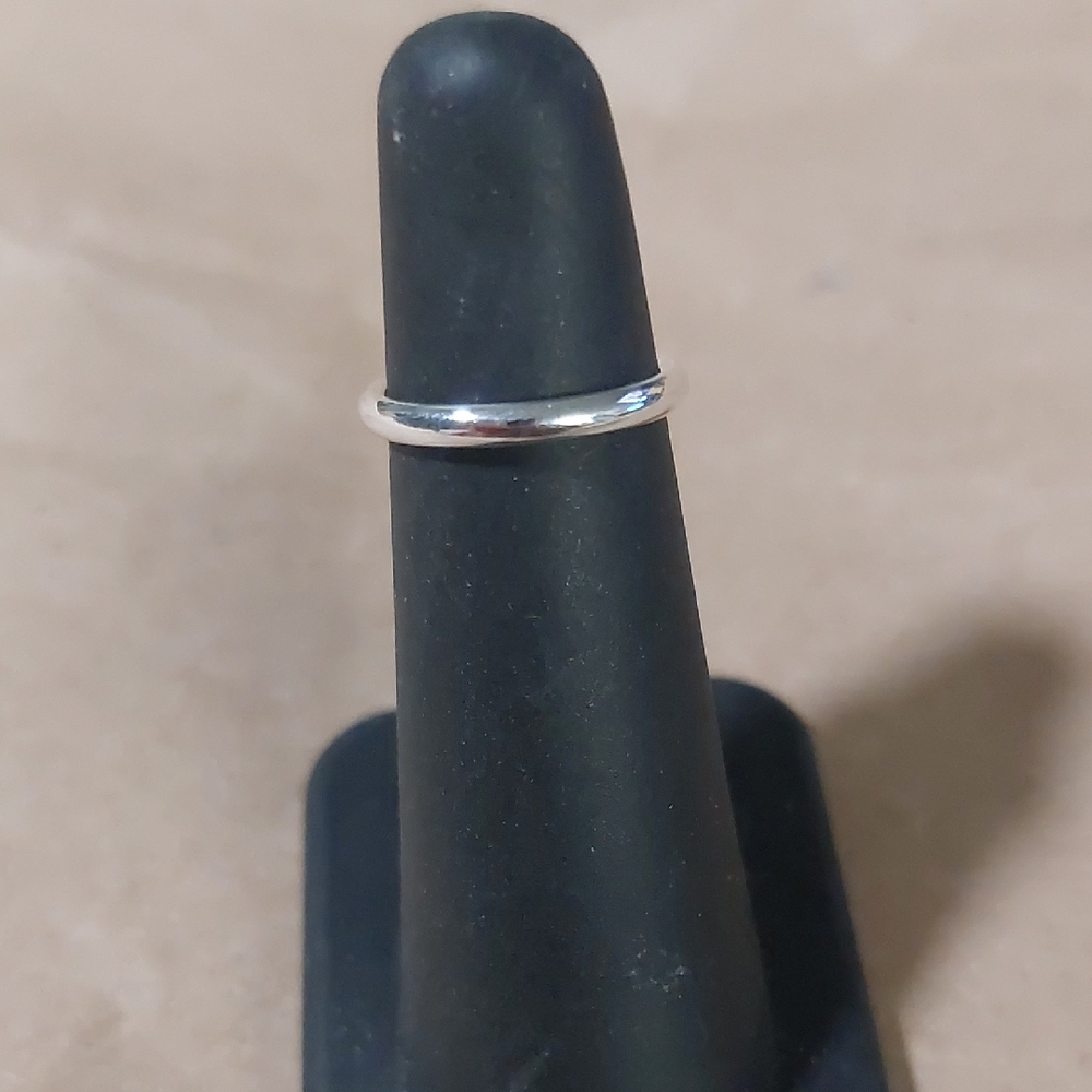 Elegant Sterling Silver Band Ring Sz 3.   2mm